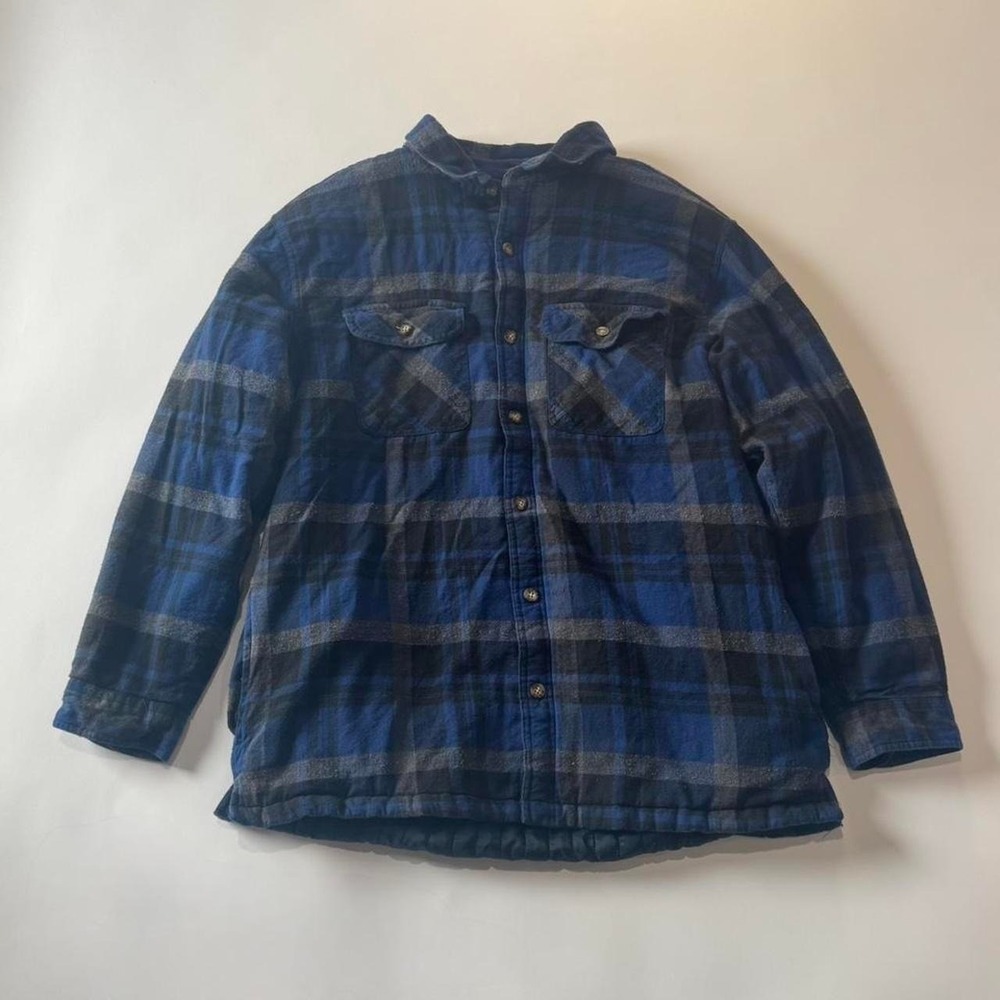 Vintage Cherokee flannel jacket in a blue and black plaid pattern